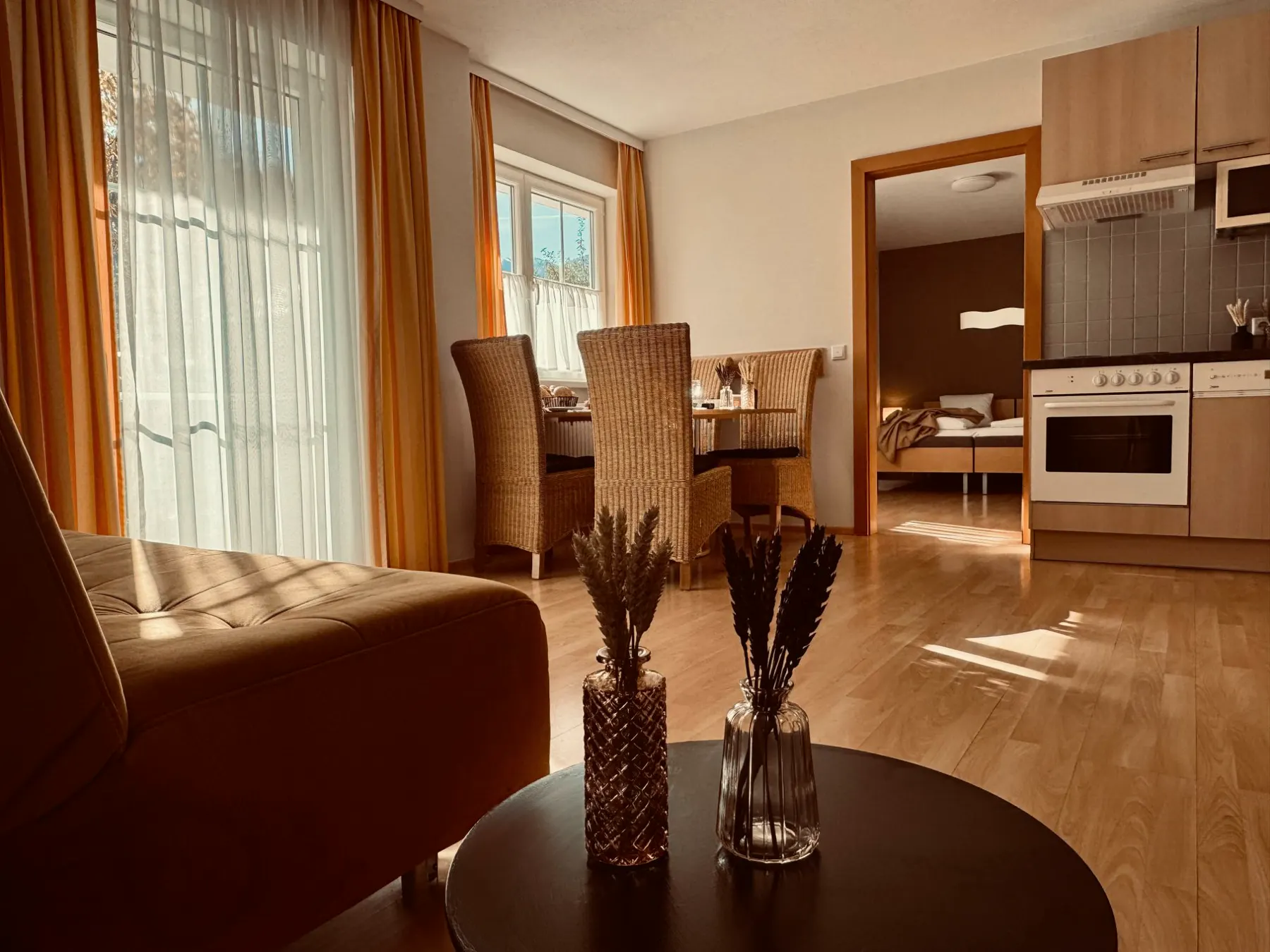 Open living area with kitchen and dining table
